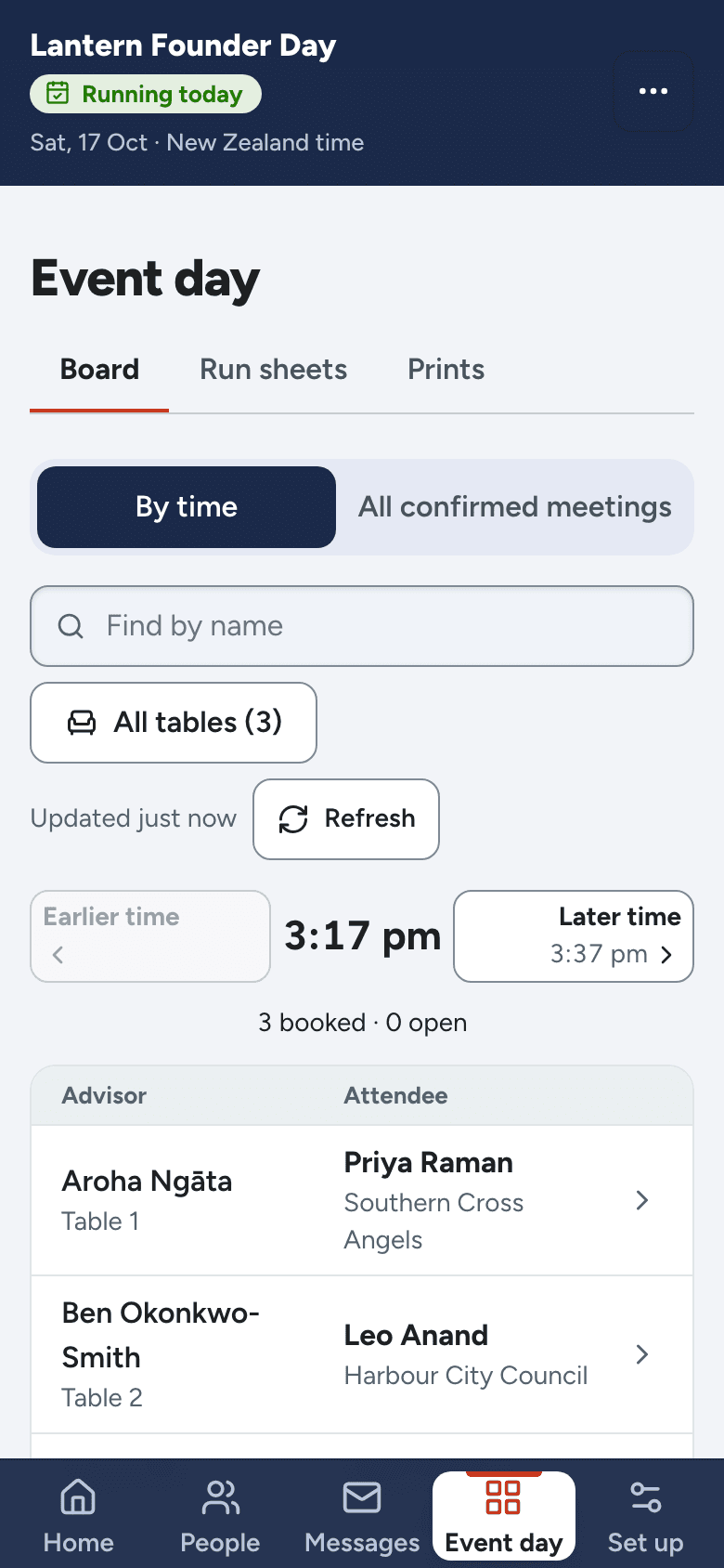 The event day board on a phone: each advisor's table with who they are meeting now and next